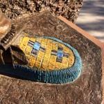 The moccasin on Dave McGary’s Bear Tracks sculpture illustrates the artist’s attention to detail. (Photo by E’Louise Ondash)